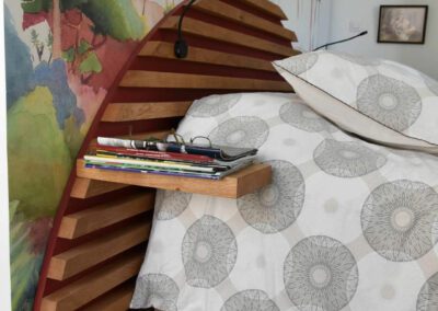 Tête de lit en bois à Ponlat Taillebourg